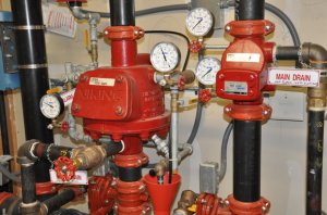 Fire alarm suppression system